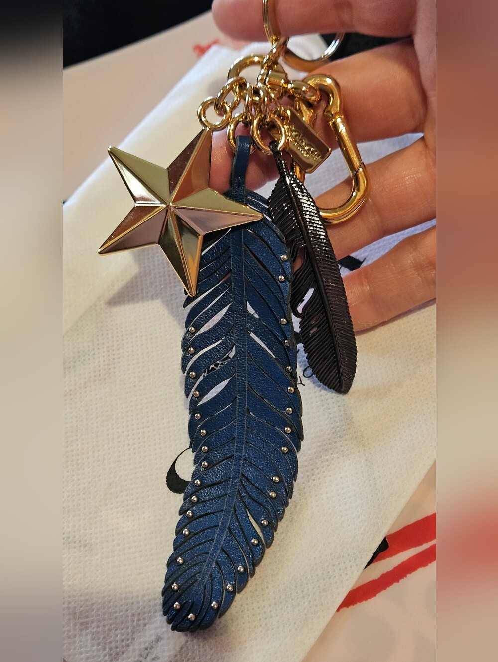 Coach Blue Leather Feather Keychain with Gold Star Charm - Picture 3 of 5